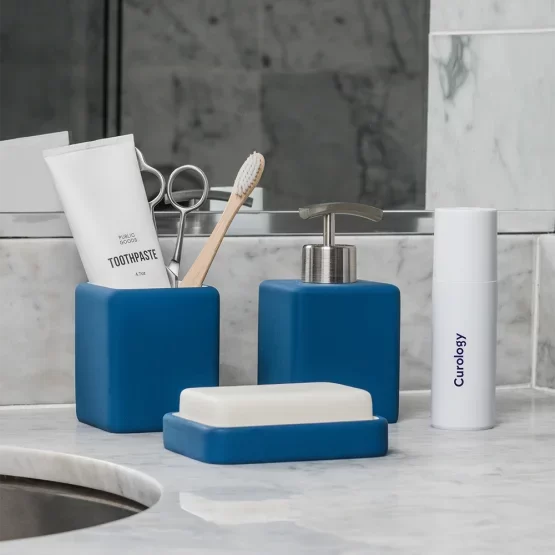 Counter top options for blue bathroom accessories: quartz versus granite.